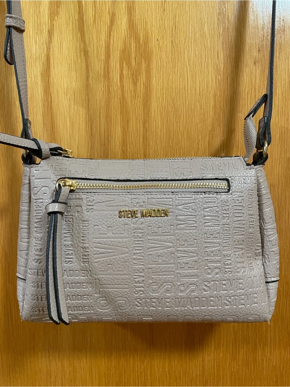Steve Madden embossed logo crossbody bag beige long adjustable strap